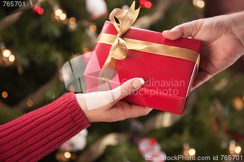 Image of Man and Woman Gift Exchange