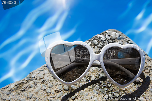 Image of Heart Shaped Sunglasses by Pool