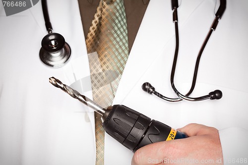 Image of Doctor with Stethoscope Holding Big Drill