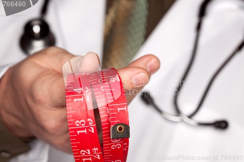 Image of Doctor with Stethoscope Holding Measuring Tape