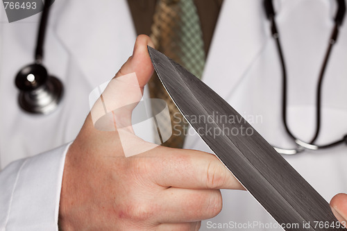 Image of Doctor with Stethoscope Holding A Large Knife