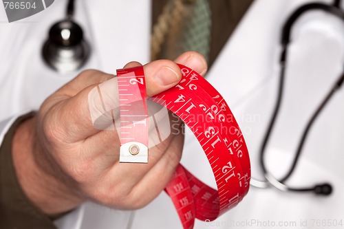 Image of Doctor with Stethoscope Holding Measuring Tape