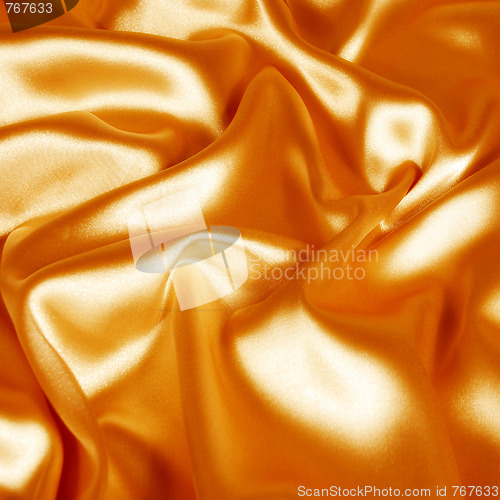 Image of elegant gold silk fabric