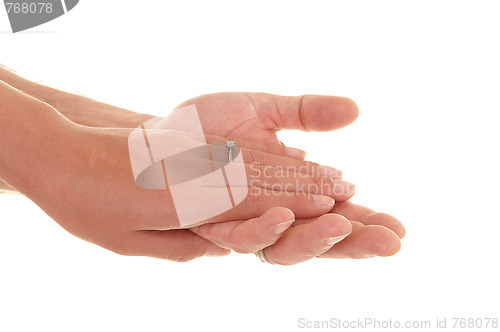 Image of Hands of man and woman.