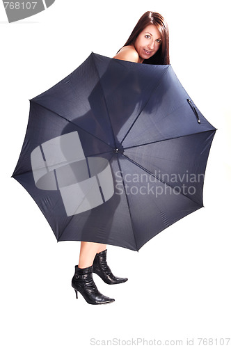 Image of Nude woman with open umbrella.