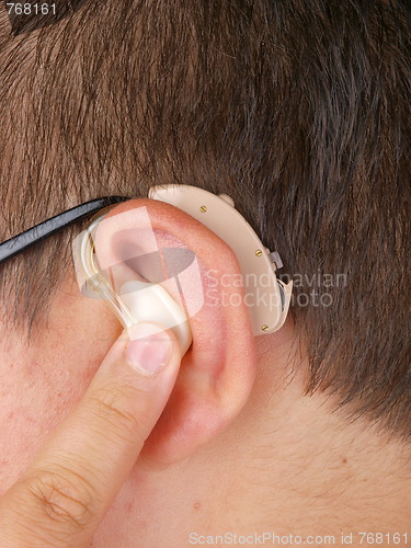 Image of Man wearing hearing aid