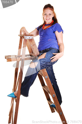 Image of Pretty girl on the stepladder.