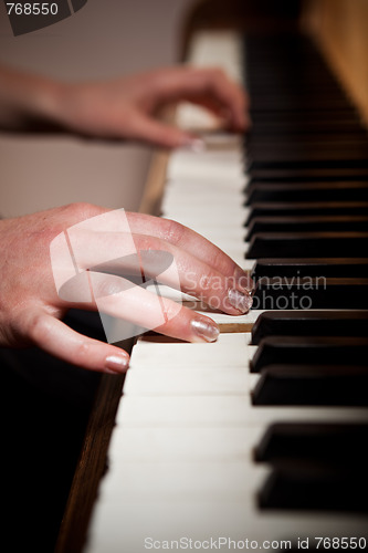 Image of Woman playing piano