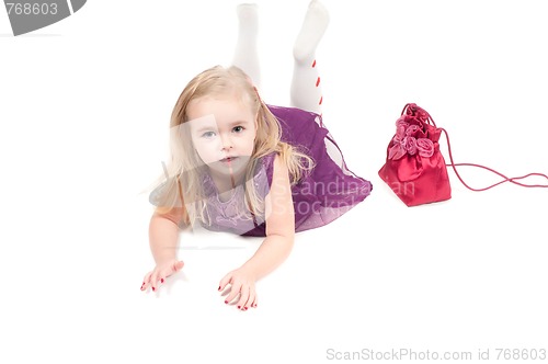 Image of Studio shot of baby girl in gala dress