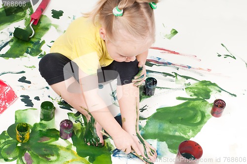 Image of Little girl painting