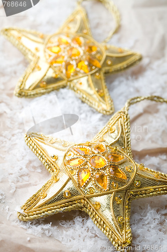 Image of Golden star shape Christmas decorations