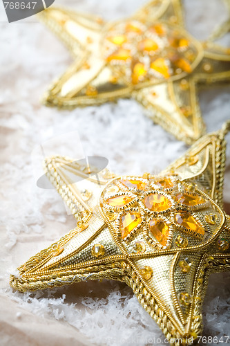 Image of Golden star shape Christmas decorations