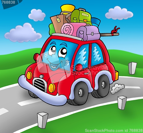 Image of Cute car with baggage on road