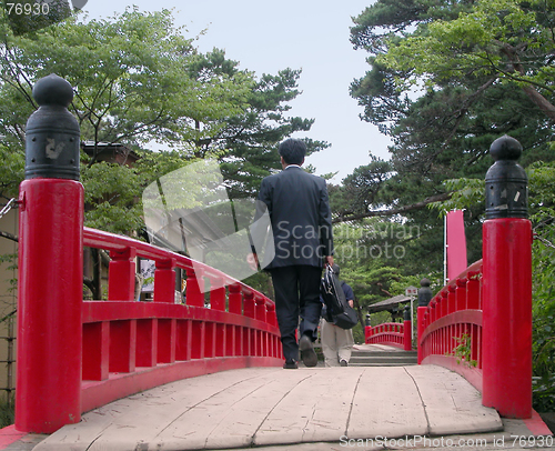 Image of Businessman on a bridge