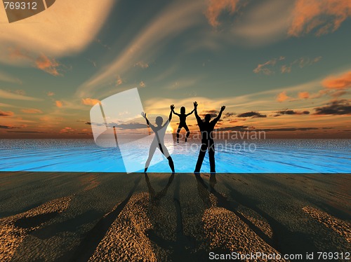 Image of Silhouette Family By the Sea