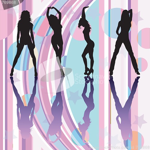 Image of Dancing girls silhouettes on discoteque atmosphere