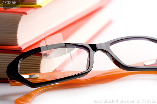 Image of books and glasses