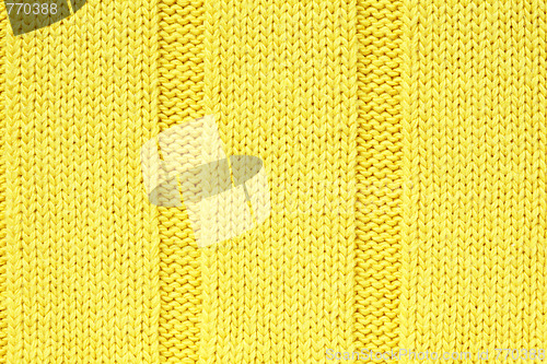 Image of Yellow knitted fabric textured background