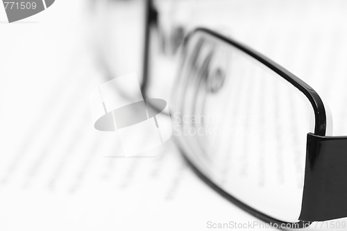 Image of Eyeglasses on open book