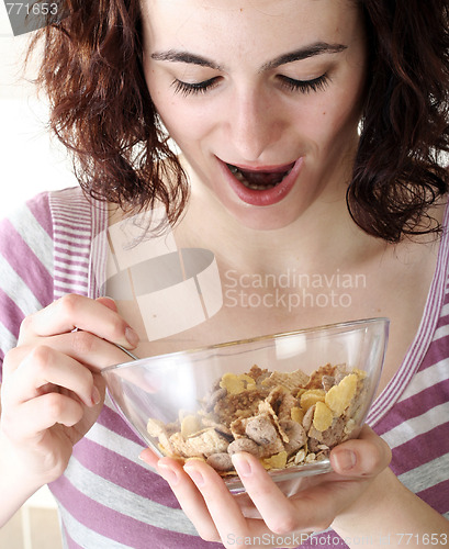 Image of Young people eating milk with cereals
