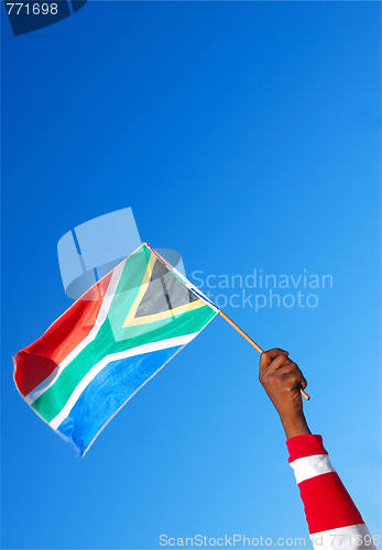 Image of Black hand with South African flag