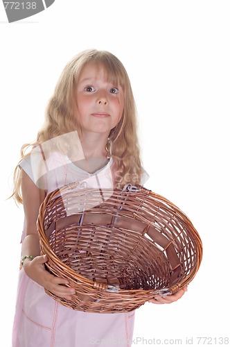 Image of Little girl playing with basket