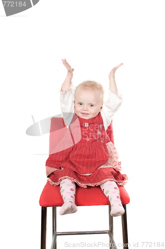 Image of Baby sitting on the chair