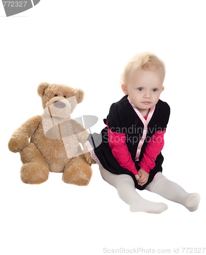 Image of Little girl playing with toy