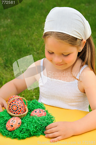 Image of Little girl enjoying Easter time