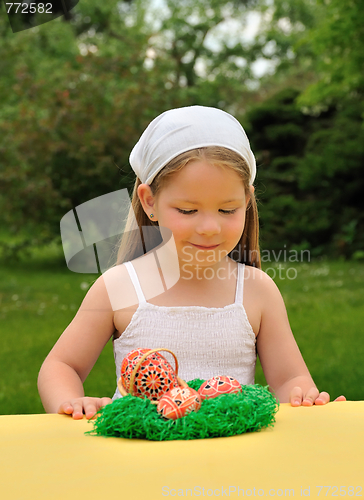 Image of Little girl enjoying Easter time