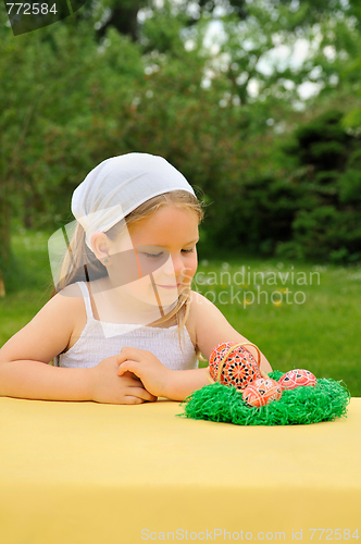 Image of Little girl enjoying Easter time