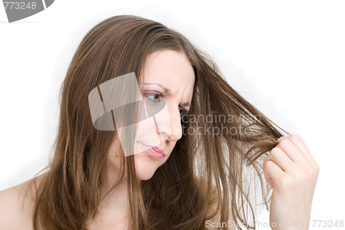 Image of Woman dissatisfied with her hair