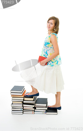 Image of Woman climbing on stairs of knowledge