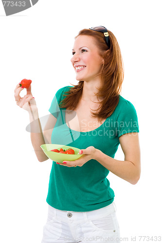 Image of Woman eating strawberry