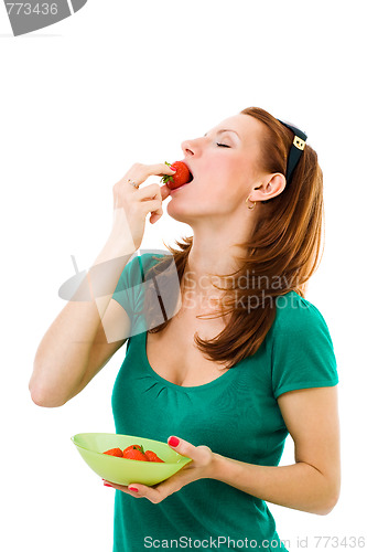 Image of woman eating strawberry