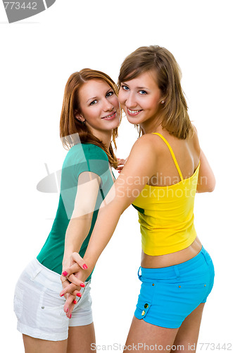 Image of Two wemen friends holding each others hands 