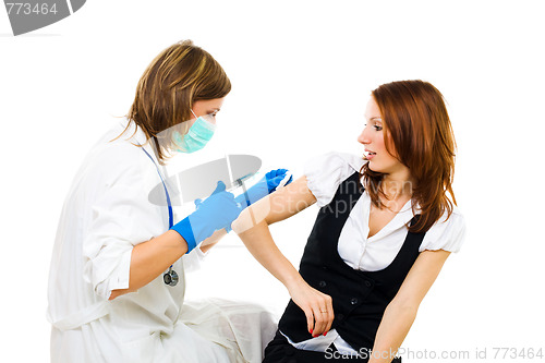 Image of Nurse vaccinating patien