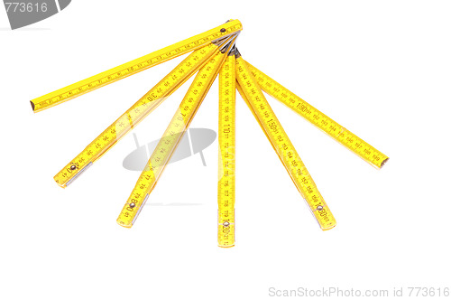 Image of Yellow wooden ruler.
