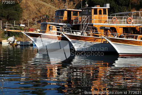 Image of Three Boats In Harbor