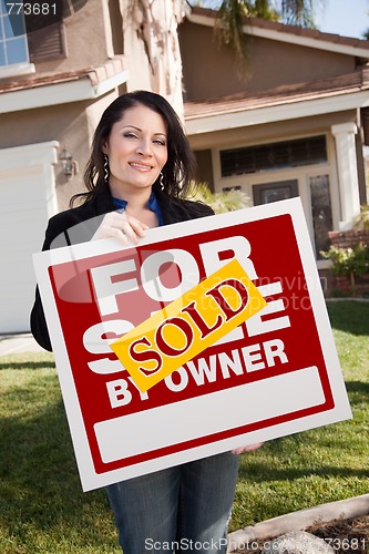 Image of Hispanic Woman Holding Sold For Sale By Owner Real Estate Sign I