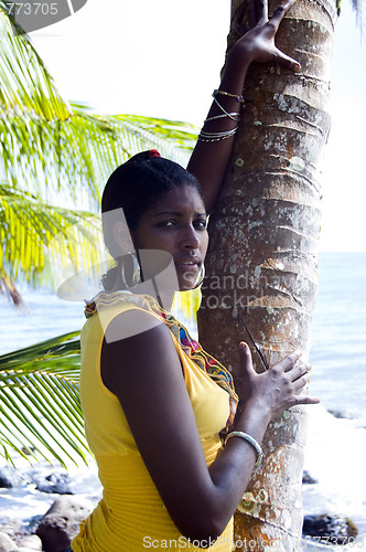 Image of pretty hispanic black woman native nicaragua portrait with palm 