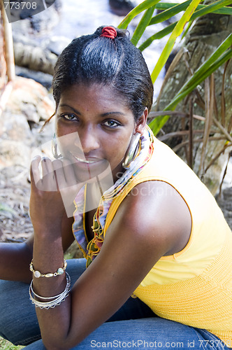 Image of pretty hispanic black woman native nicaragua portrait with palm 