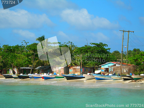 Image of panga fishing boats with houses corn island nicaragua