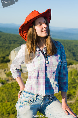 Image of Woman in cowboy hat