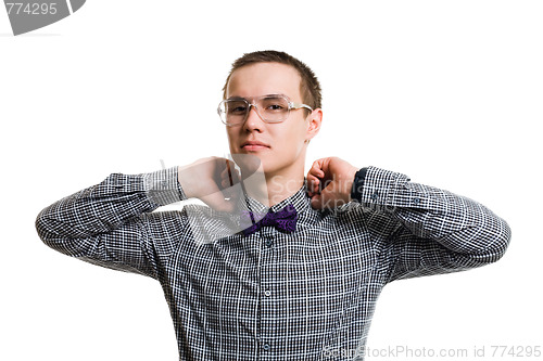 Image of Confident handsom young man set collar straight 