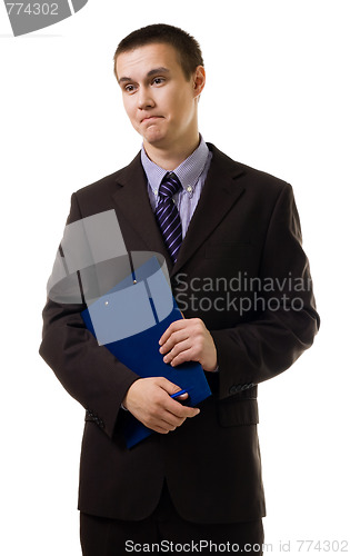 Image of Confused young business man stand in formal suit