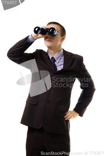 Image of Man in formal suit look into binoculars