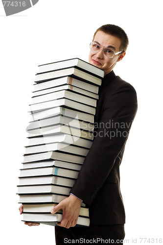 Image of Man hold huge ammount of books expressing negativity 