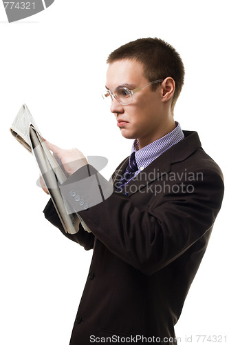Image of Shocked man read newspaper