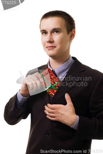 Image of Young man with a red present